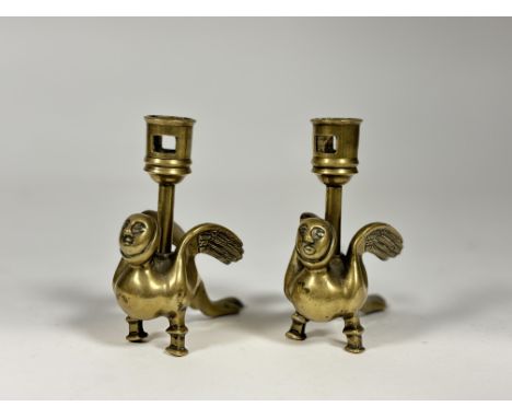 A pair of brass candlestick holders in the form of a harpy. (h-12cm) (2)