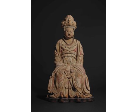 AN IMPORTANT AND RARE LARGE WOOD FIGURE OF A DAOIST DEITYSong (960-1279)Seated facing forward, with her head slightly leaning