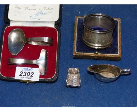 A small quantity of silver including Sheffield silver christening spoon and pusher, dated 1957 by Viners Ltd, miniature armch