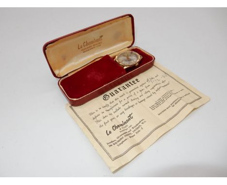 A presentation cased Le Cheminant 17 jewels Chronometer specially Tested" 9ct gold cased gentleman's Wrist watch having a sil