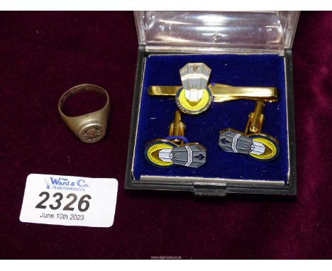 A Cufflinks and tie pin set having Masonic emblems to commemorate 150th anniversary together with a skull ring of the same st