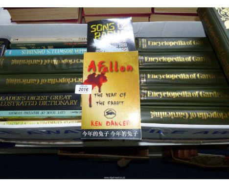 Two boxes of books containing; Encyclopedia of Gardening, Gnomes, The Year of the Rabbit by Ken Dancer, etc.