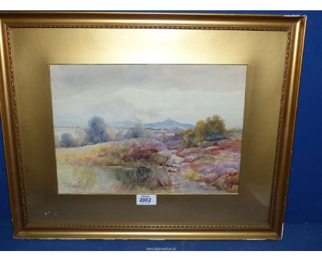 J.M Jowett: a watercolour of a moorland landscape, 9'' x 13 3/4''.
