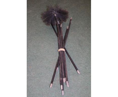 A collection of chimney sweep brushes&nbsp;