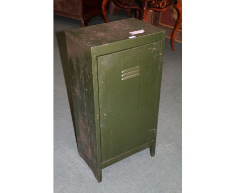 A green painted metal locker, with a single door opening to reveal a single shelf, 92cm high 46cm wide&nbsp;