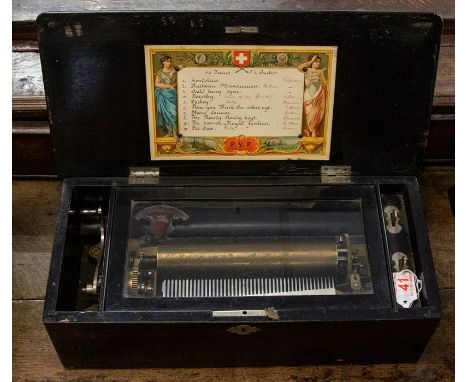 A 19th Century Swiss rosewood musical box,&nbsp;playing 10 airs on 21cm cylinder and 56 tooth comb, with type sheet to inside