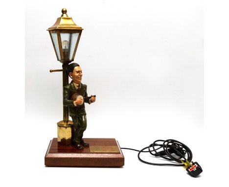 George Formby (1904-1961). Novelty table lamp modelled as George leaning on a lamp post, bearing engraved brass plaque, 'Geor