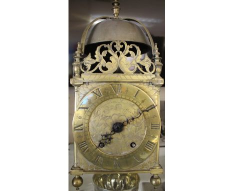 A mid 17th century brass lantern clock case only, the dial inscribed 'Peter Closon near Holborn Bridge fecit',&nbsp;the strap