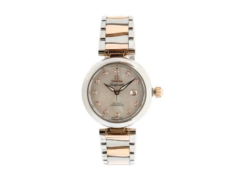 Omega- a ladies Omega De Ville Ladymatic Co-Axial 8520 chronometer, mother of pearl dial inset with diamond and with rose ton