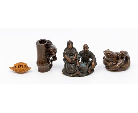 A carved hardwood netsuke, as a frog on bamboo, approx 5cm long; another as a frog and snake, approx 3cm high; a Chinese figu