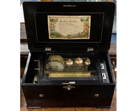 A 19th Century Swiss rosewood musical box, with drum and three bells,&nbsp;playing 10 airs on 24cm cylinders and 52 tooth com