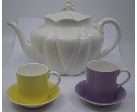 A Royal Worcester coffee can and saucer, circa 1906, plain yellow ground, can approx 5cm, saucer approx 8.3cm diam; a Royal D