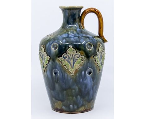 A Doulton Lambeth Art Nouveau whisky flagon, inscribed 'Scotch', blue mottle glaze, approx 22cm high, impressed marks and num