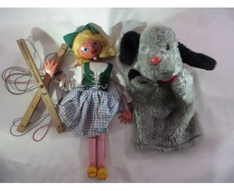 A Pelham puppet and a Sweep hand puppet.