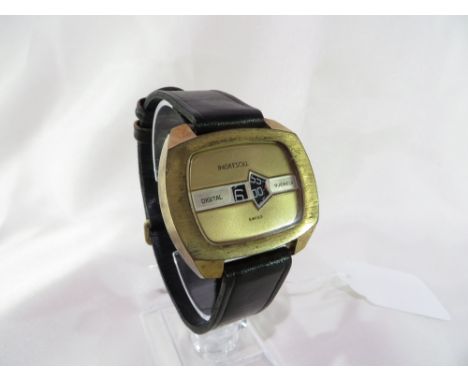 A gents Ingersoll Digital 'jump hour' watch.