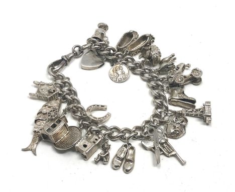 Heavy Vintage silver charm bracelet weight 86g