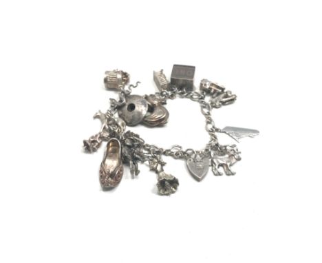 Vintage heavy silver charm bracelet weight 46g