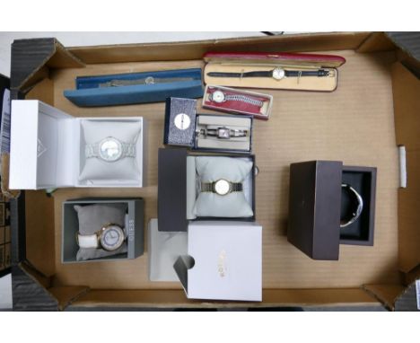 A collection of boxed ladies watches including Guess, Rotary, Sekonda, DKNY, Montine etc 