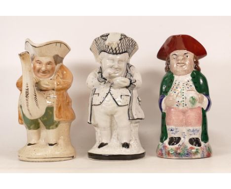 Three Toby Jugs to include a Monochrome Snuff Taker, a Snuff Taker Lustre Teapot and one Later Reproduction on Sponged Base. 