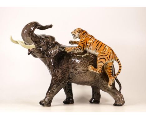 Beswick Elephant and Tiger 1720. Restoration to tails, trunk and both tusks. 