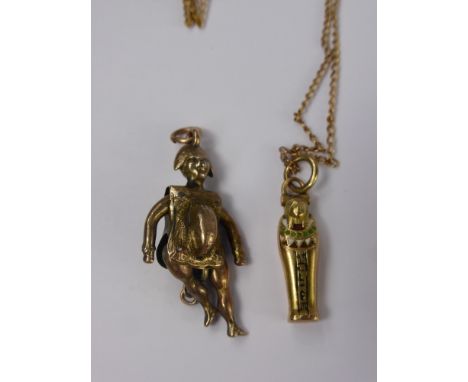 A Lady's 14 ct Gold and Enamel Pendant, in the form of an Egyptian sarcophagus with a mummy inside, the pendant suspended fro