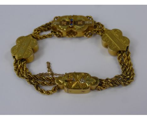 A Lady's Edwardian 14 ct Rose, Yellow and White Gold Gilded Fancy Bracelet, the bracelet having three strands rope chain link