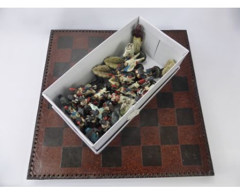 A Resin Chess Board with playing figures of the Napoleonic era.