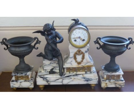 A 19th Century French Marble Mantel Clock and Garniture, decorated with a seated putti, the enamel face hand painted with ros