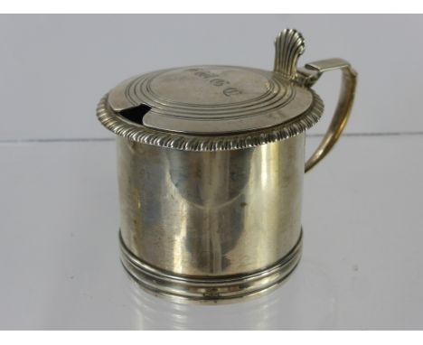 A Victorian Silver Mustard Pot, hinged lid with thumb piece, engine turned lid with roped edge decoration, London hallmark, d