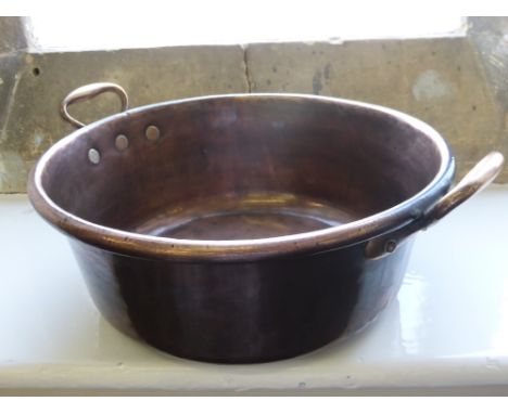 A Large Vintage Copper Basin with handles, approx 38 x 16 cms.