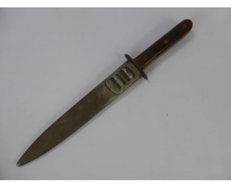 An Italian Fascist Officer's Commando Knife 1930, the knife having wooden handle with metal scabbard, blade approx 19 cms.