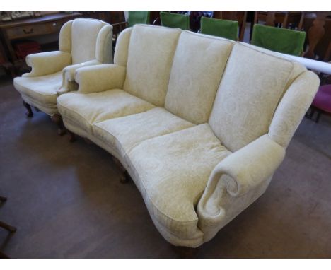 An Oak Framed Three Seater Sofa, with ball and claw feet approx 188 x 116 x 90 cms together with a matching armchair.