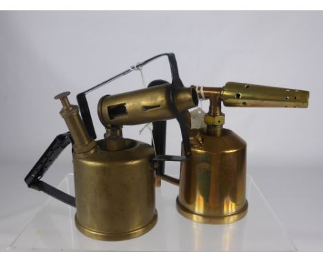 Three Vintage Brass Blow Torches, including Burmos, The Premier, Smallwood Bros., and the Monitor No. 24A together with a Pre