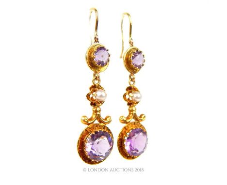 A pair of antique, 18 ct yellow gold, French, amethyst and faux pearl drop earrings, composed of two faceted, round amethyst 