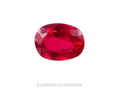A natural, oval shaped, faceted, ruby: 12 x 9 mm, (7.15 carats)