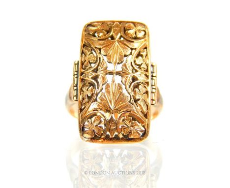 A unique, 19th century, 18 ct yellow gold, rectangular, palmette-tracery ring, to wide shoulders and a round shank, Size: M 1