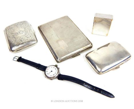A sterling silver cigarette case, Joseph Gloster Ltd, Birmingham 1914, engraved with scrolling leaves, monogrammed, 8.5 x 6.5