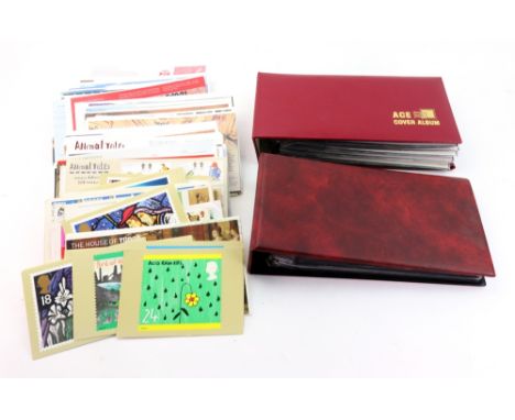 A large collection of Great Britain First Day covers, including some in two red albums, a few world covers, and a few stamp p