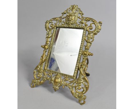 A Pierced Carved Brass Easel Back Mirror, 26cms High 