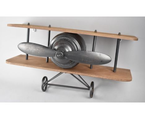 A Modern Novelty Wall Shelf in the form of a Biplane, 60cm wide 