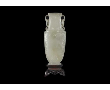 A Chinese grey-green jade vase, Qing Dynasty, 18th/19th century.  With attached circular paper label inscribed 'L. WANNIECK, 