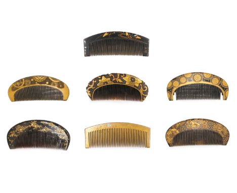 A Japanese gold makie decorated tortoiseshell comb, Edo period. 3.5 x 8.3cm; two further gold decorated tortoiseshell combs, 