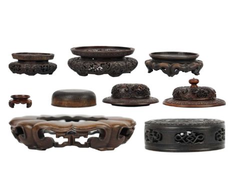 Various Chinese carved wood stands and covers, 19th/20th century. Five stands and four covers, including a carved dragon deco