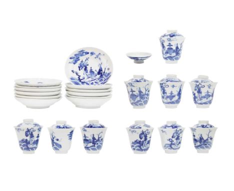 A set of Chinese blue and white porcelain cups, covers and stands, 18th century.  Late Kangxi period, comprising ten cups and