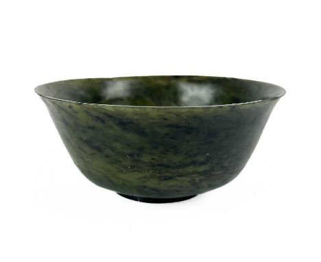 A Chinese spinach jade bowl. Height 5cm, diameter 10cm.