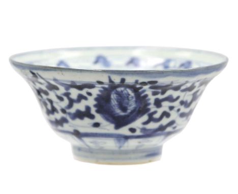 A Chinese blue and white provincial bowl, Ming Dynasty.  With palmettes and tendrils, seal mark, height 7cm, diameter 14.5cm.