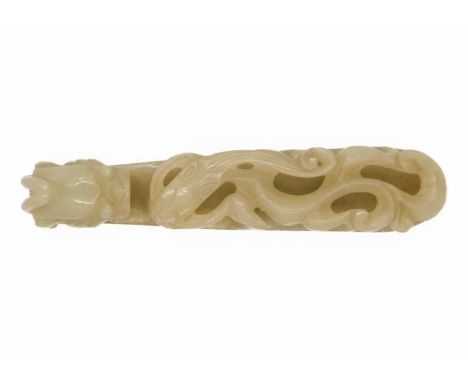 A Chinese jade belt hook, Qing Dynasty, late 19th/early 20th century. The shaft with a chilong clasping a lingzhi in its mout