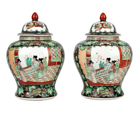 A pair of Chinese famille noire baluster vases, early-mid 20th century. Red seal mark and old paper label, height 26.5cm, wid