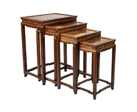 A Chinese hardwood quartetto of tables, early 20th century.  With burl wood rectangular tops on legs of square section, joine