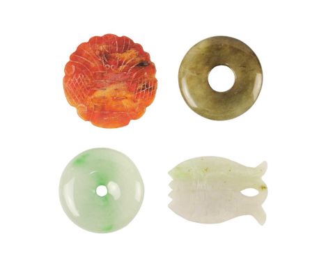 A Chinese jade disc. Diameter 5cm; a Chinese jade fish pendant, 6 x 4cm, and two hardstone discs, diameters 5.5 and 5cm. (4)